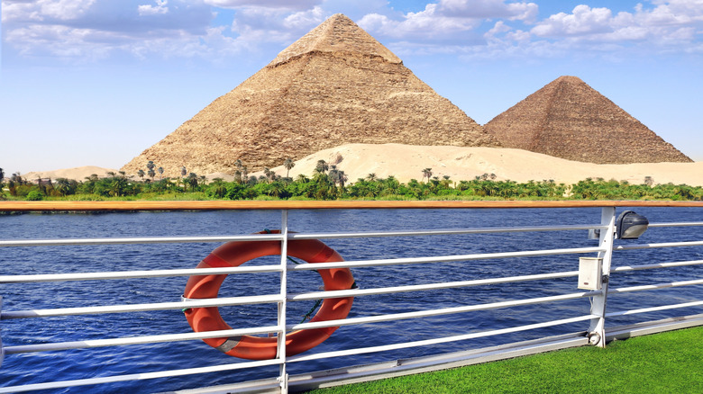 Pyramids viewed from boat on Nile