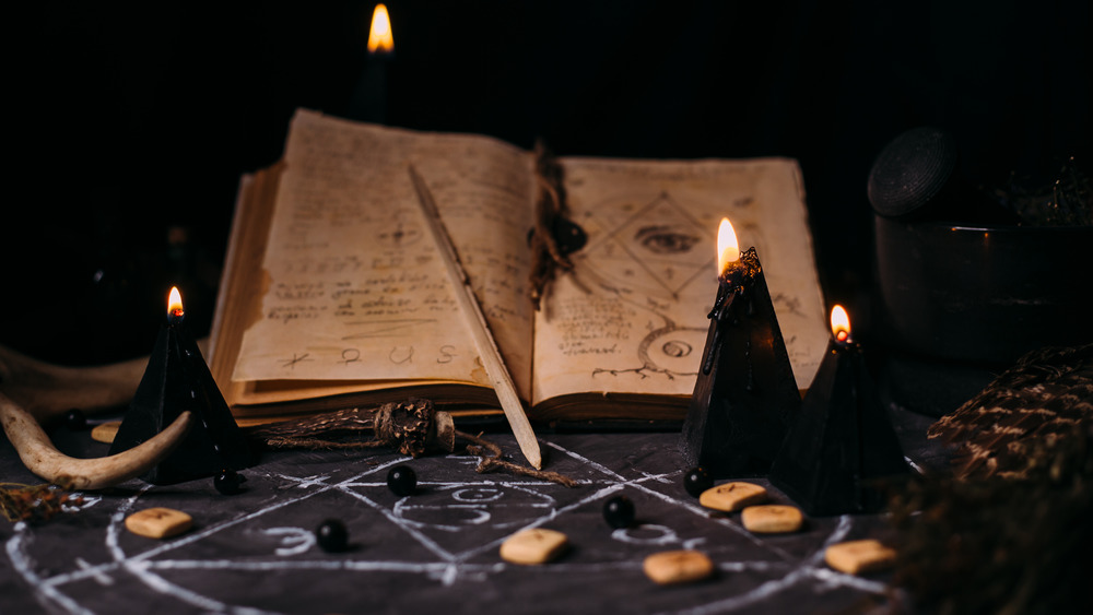 Spell book on a witch's alter