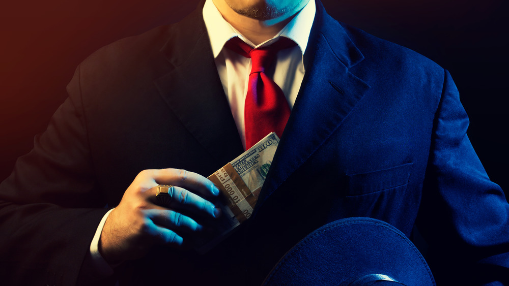 Rich man red tie money