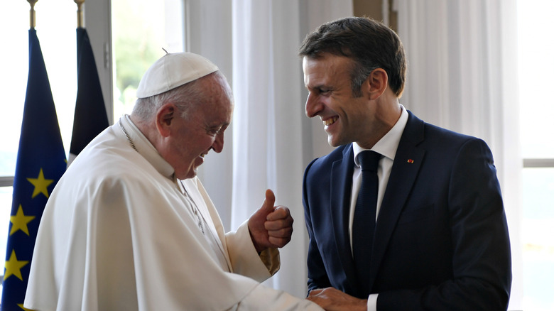 Pope Francis and Macron.