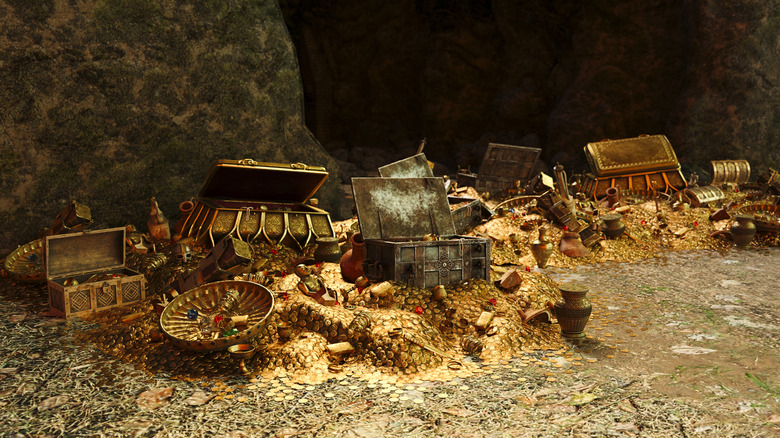 Scattered treasure and treasure chests in cave setting.