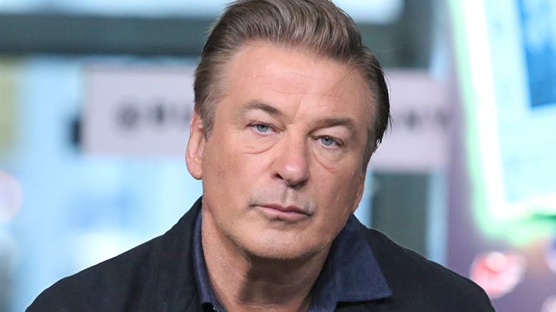 alec baldwin head tilted thoughtful