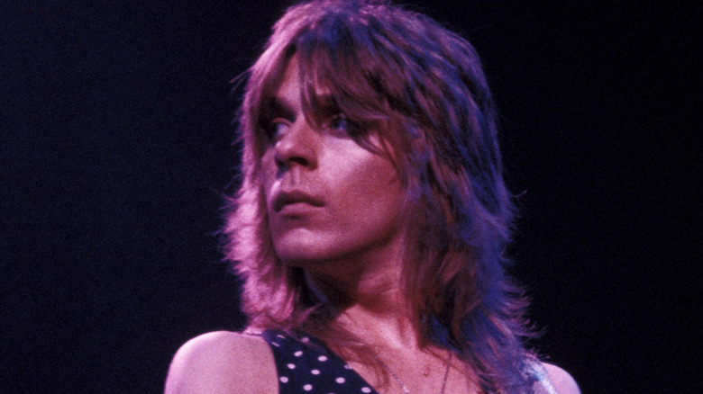 Randy Rhoads onstage looking to side