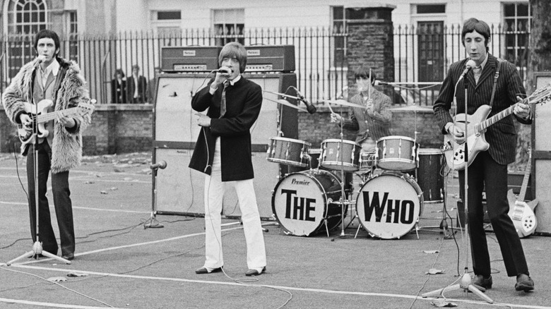 The Who playing outdoors in street