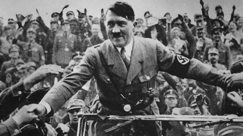 Hitler being greeted by supporters