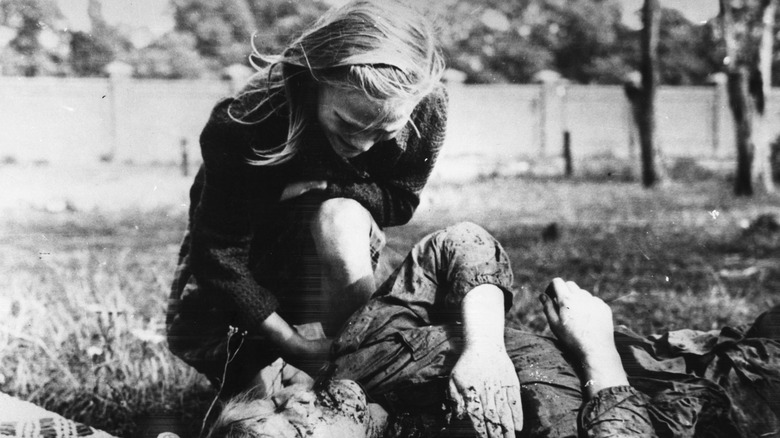 A girl grieves the death of her sister during the invasion of Poland