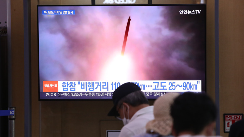 a video screen showing a missile launch