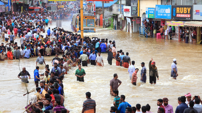 crowd of people in flooded street