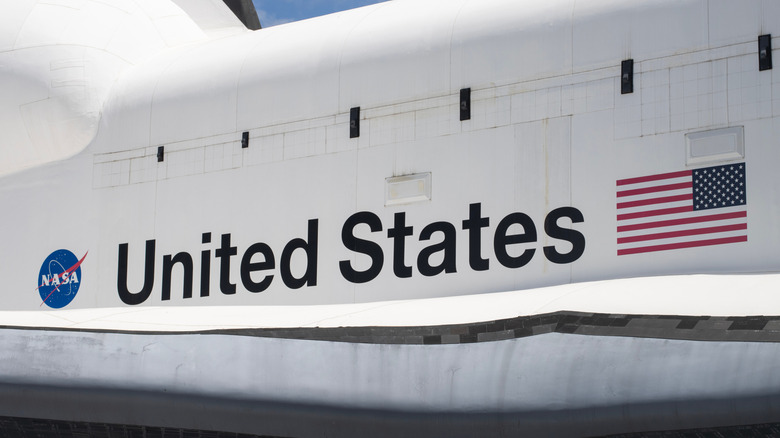 United States and NASA logo on Space Shuttle replica