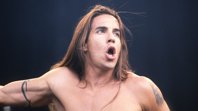 Red Hot Chili Peppers' Anthony Kiedis pulling a face on stage in Belgium in 1992