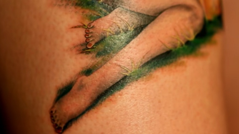 tattoo with two right feet