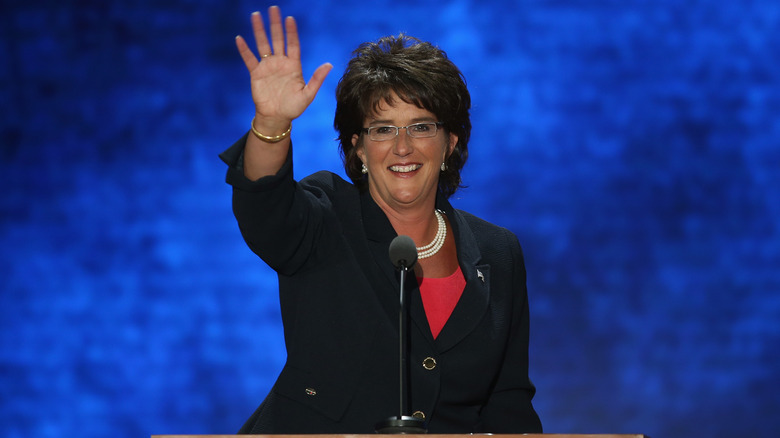 Jackie Walorski waving in front of microphone