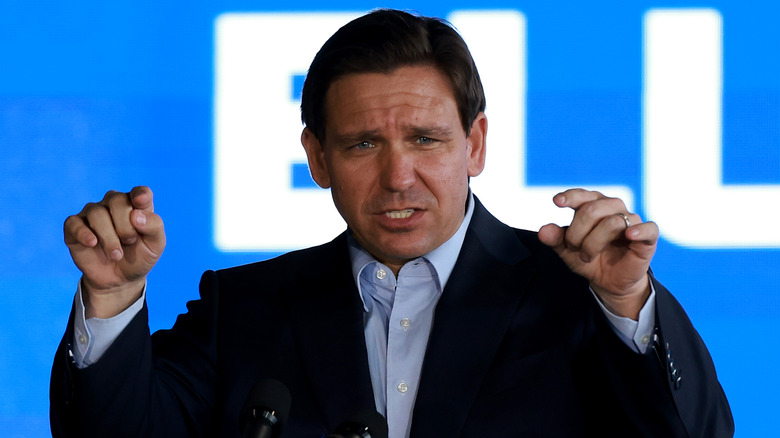 Ron DeSantis looking angry while speaking onstage