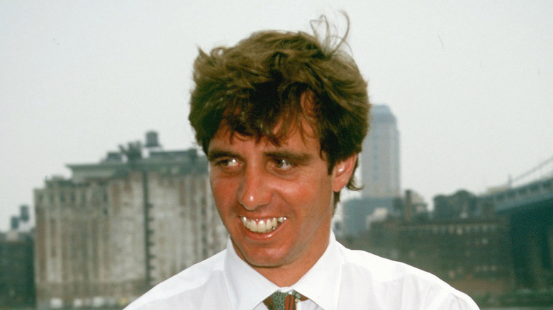 Michael Kennedy smiling outside
