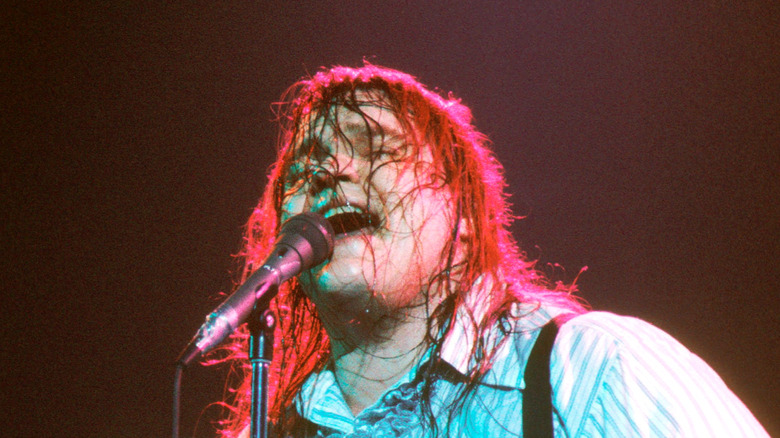 Meat Loaf singing onstage in the 1970s