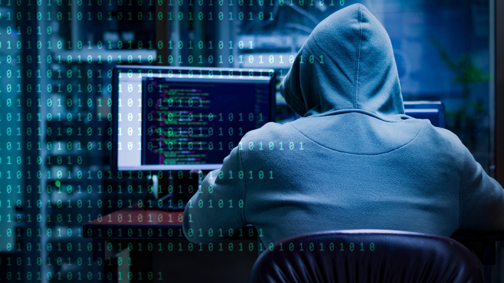 A hacker working at his computer