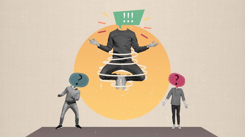 Hovering person amidst question marks