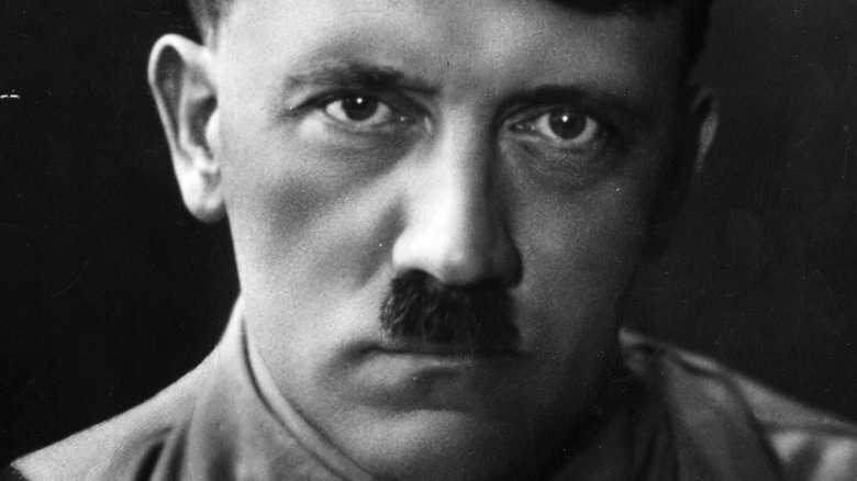 adolf hitler on a black background world war II