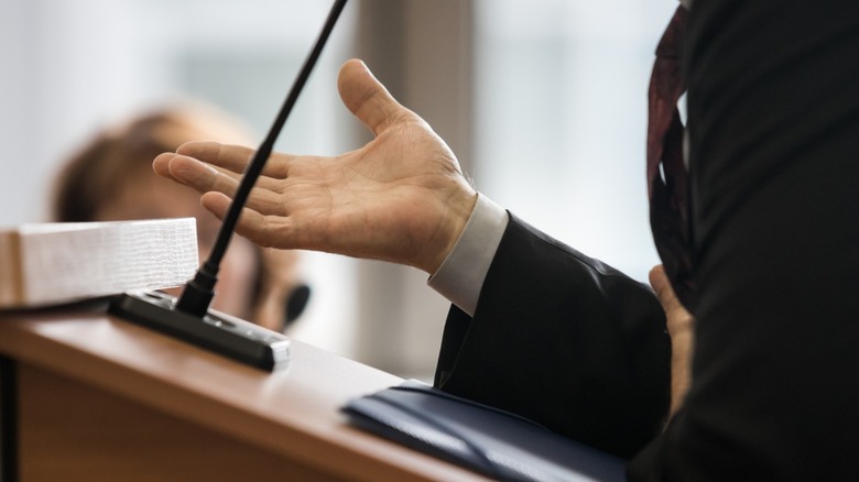 man giving statement to a court