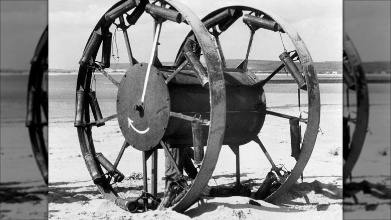 Panjandrum test weapon seen on beach.
