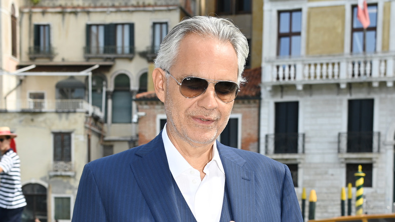 Andrea Bocelli standing in Venice