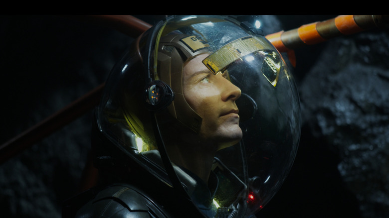 Screenshot of Michael Fassbender in very large space helmet, from Prometheus film