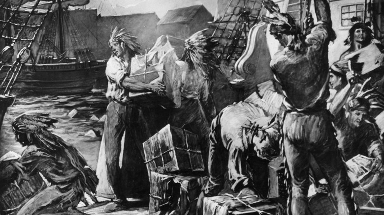 The Sons of Liberty dump tea into Boston Harbor
