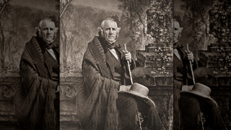 Sam Houston poses with a hat and cane
