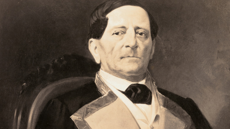 Santa Anna sits back in his chair