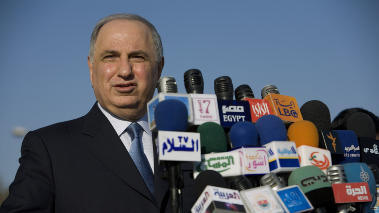 de-baathification minister at press conference