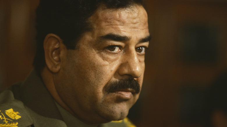 headshot of hussein