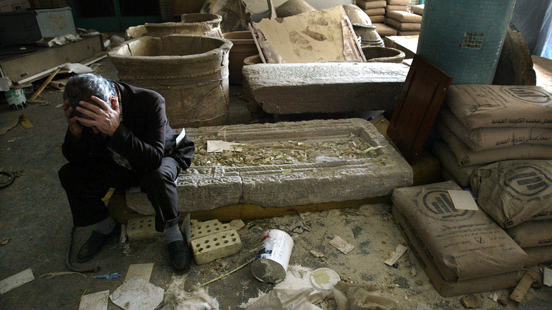 director of iraq national museum among looted artifacts