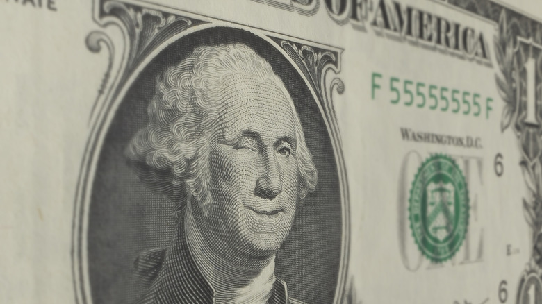 Washington winking on $1 bill