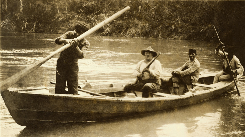 Roosevelt on canoe in Amazon river