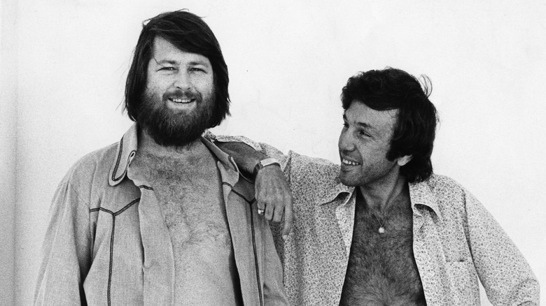 Eugene Landy's arm on Brian Wilson's shoulder