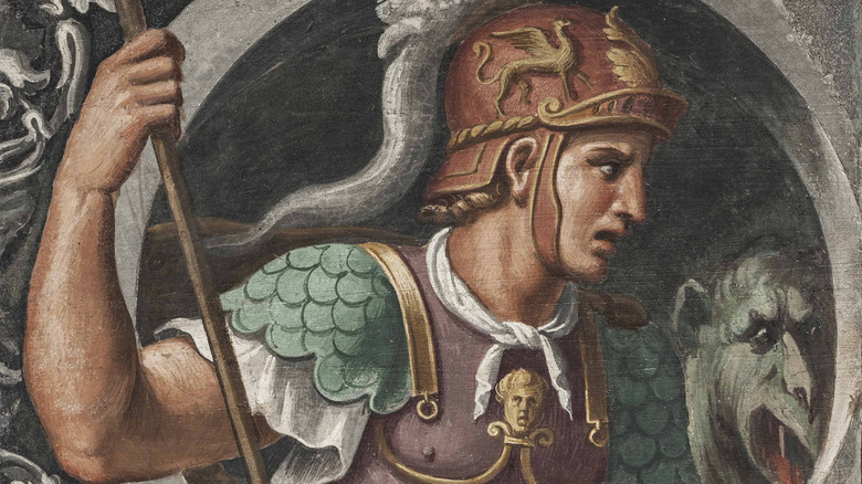 Saint George in uniform leans over beast