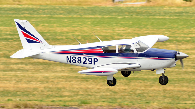 Piper PA-24 Comanche flying