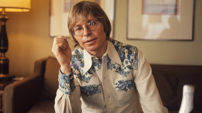 John Denver posing for photograph
