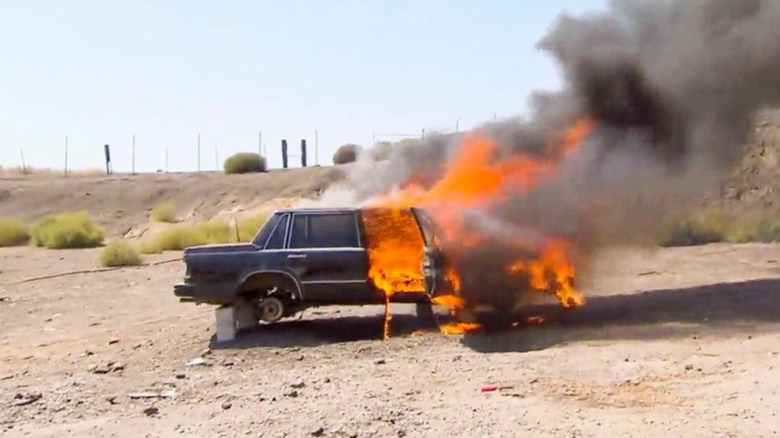 Screenshot of car mid-fire in Mythbusters Exploding Bumper episode