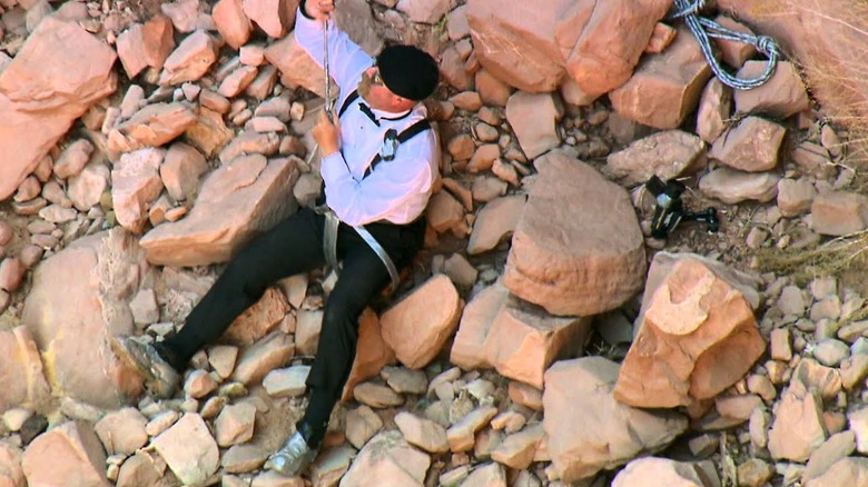 Screenshot of Jamie with rope and harness from Duct Tape Canyon special