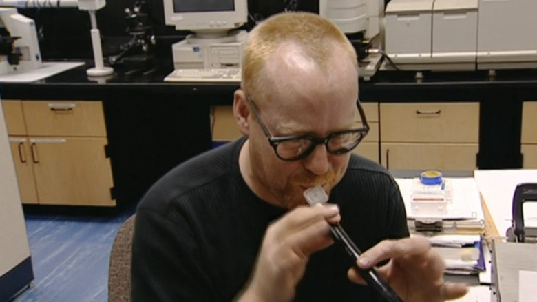 Adam Savage blowing into breathalyzer in Mythbusters screenshot