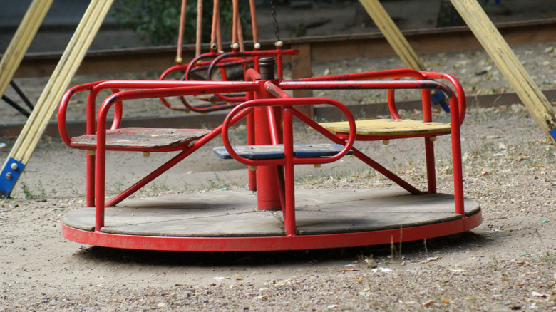 Red playground merry go round