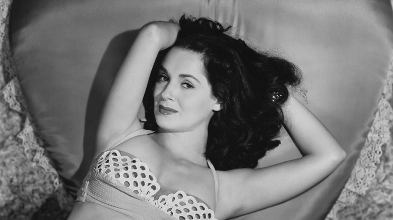 susan cabot reclining on satin cushion