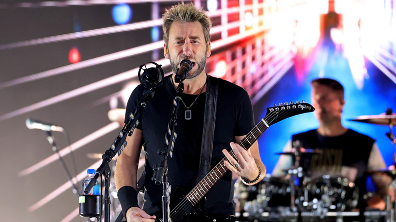 Nickelback's Chad Kroeger playing on stage at the 2023 Toronto International Film Festival