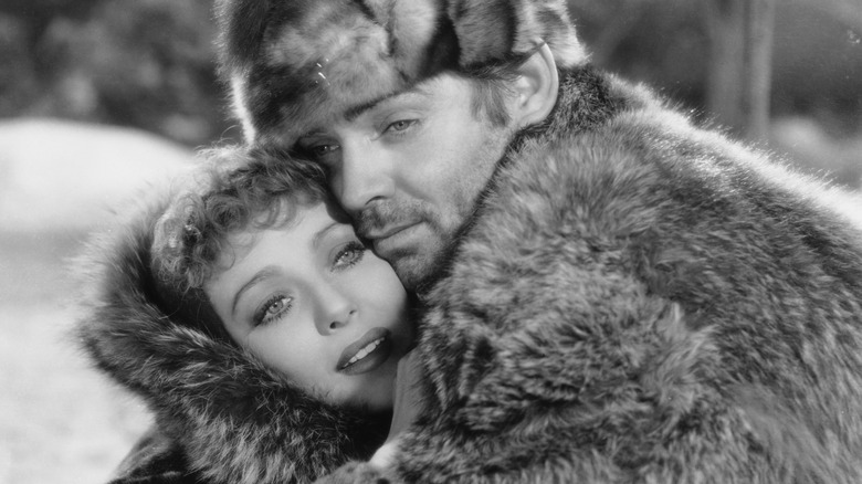Loretta Young and Clarke Gable embrace
