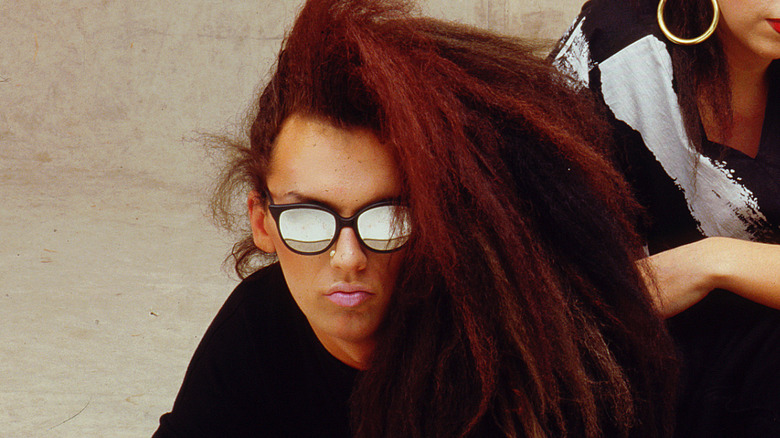 Pete Burns in sunglasses in 1980s Dead or Alive promo photo