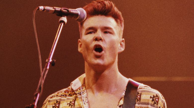 Stuart Adamson playing onstage with Big Country