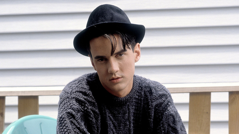 Tommy Page posing in jaunty hat