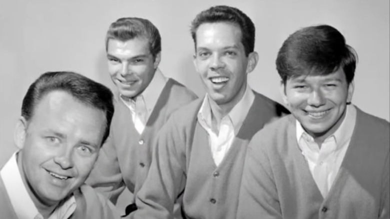Bob Kuban and the In-Men smiling wildly in publicity photo