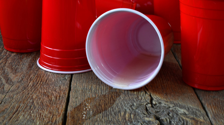 Red Solo cups on a picnic table